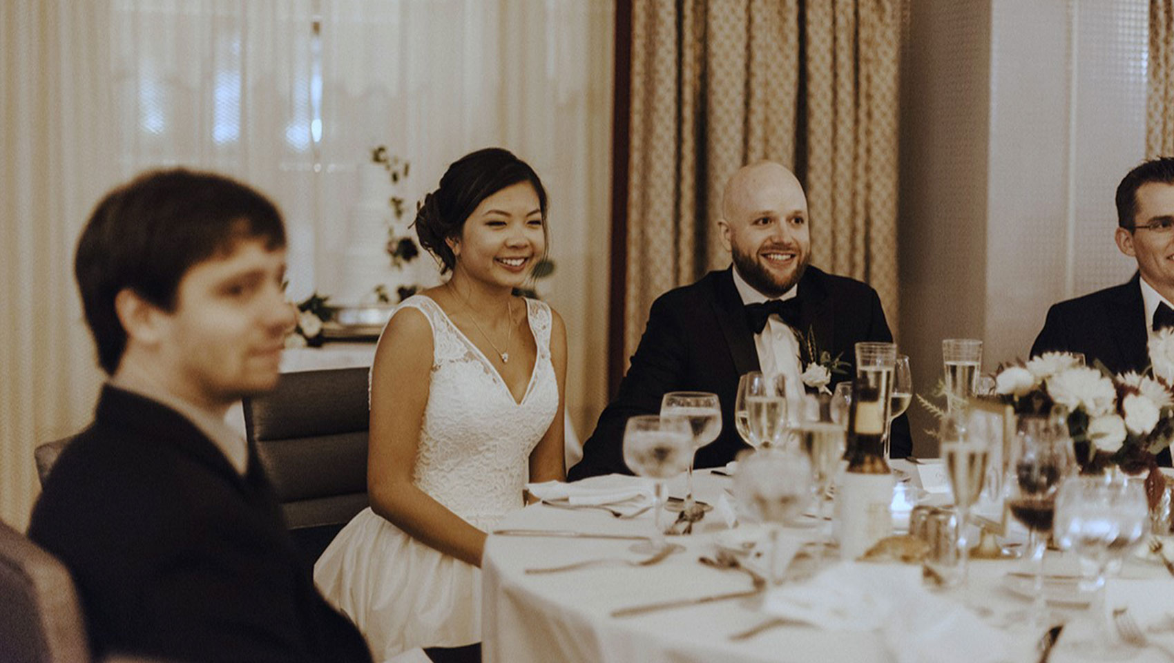 bride smiles during reception dinner in paris ballroom at Kimpton Hotel Monaco Washington DC